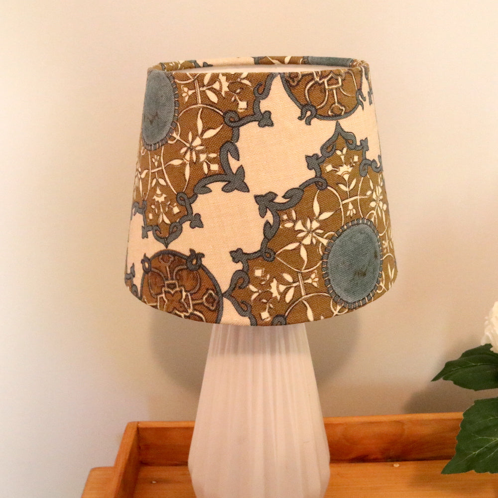 Custom empire lampshade in a stunning Nine Muses by Tigger Hall fabric. 