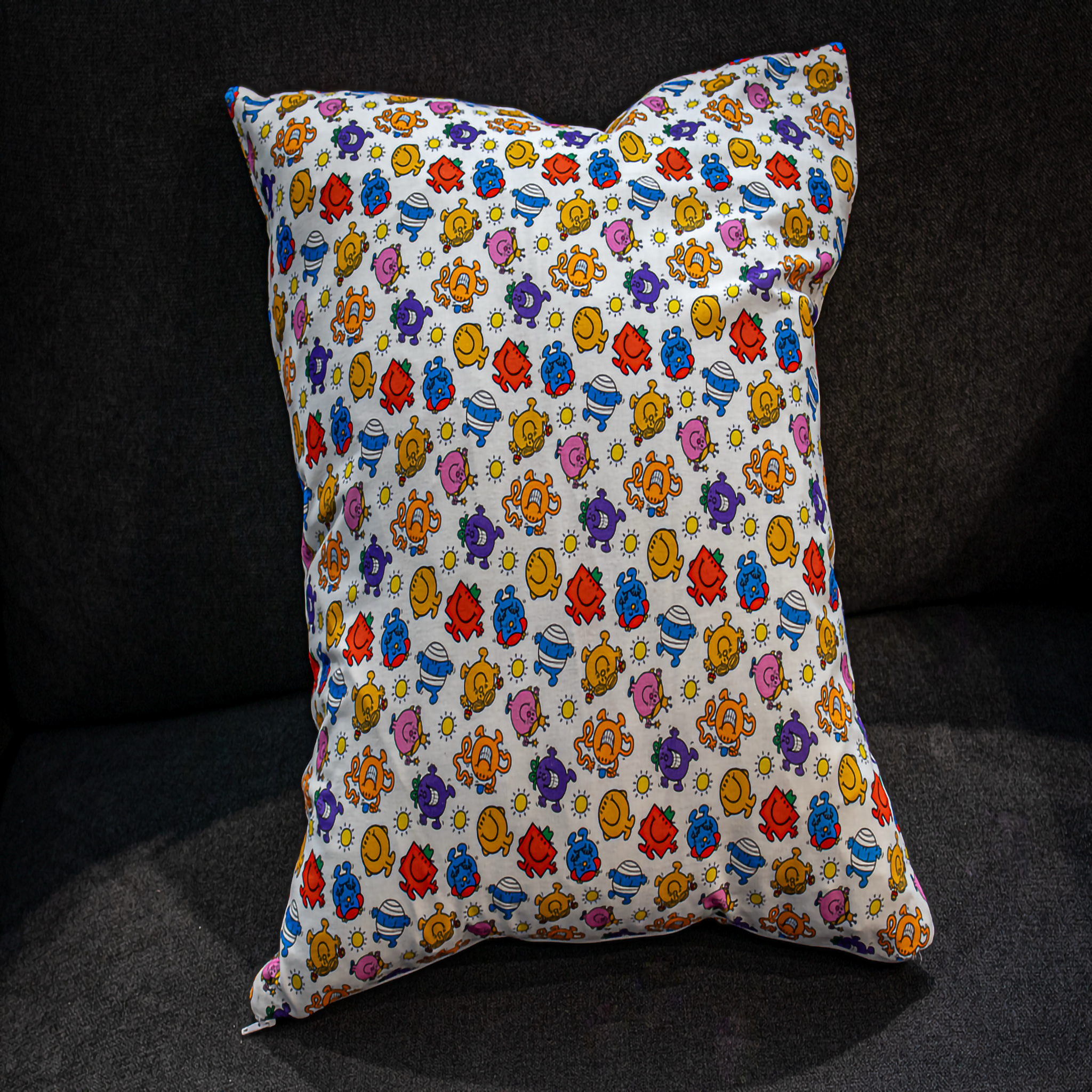 Colorful cushion featuring an all-over Mr. Men & Little Miss character print on a white background. This 50 x 50 cm pillow is playful, nostalgic, and fun — perfect for kids’ bedrooms, playrooms, or anyone who loves classic storybook characters. Luxe & Humble exclusive.