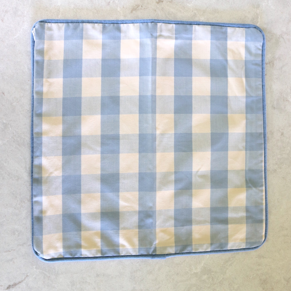 Periwinkle gingham cushion with periwinkle piping
