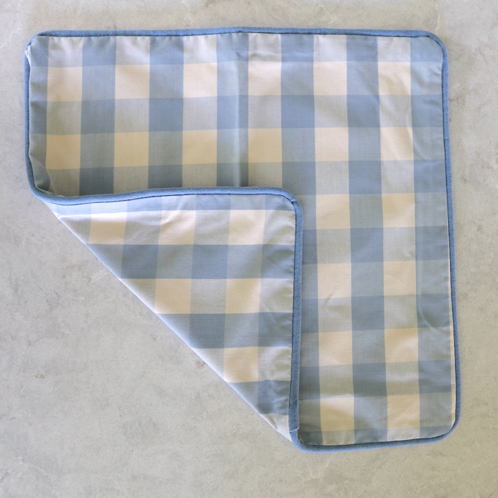 Periwinkle check cushion with periwinkle piping (front & back)