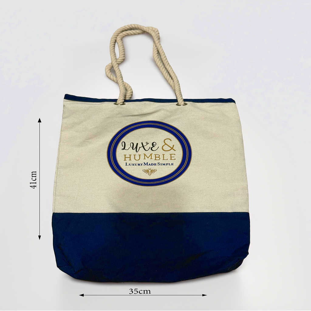 A product image of the Luxe & Humble canvas tote bag showing its exact measurements: 41cm high and 31cm wide. Features natural canvas, navy base panel and rope handles on a clean white background. Ideal for Australian shoppers wanting precise size reference.