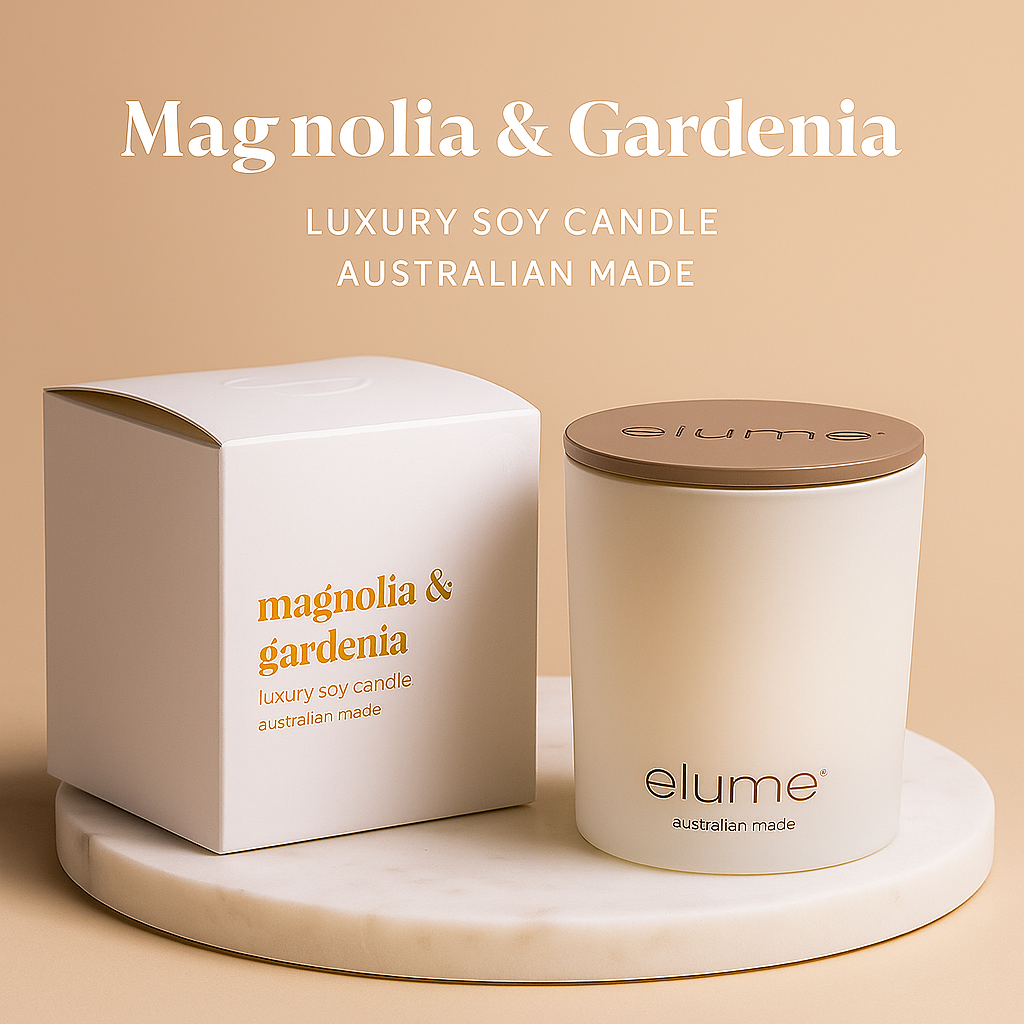 Elume magnolia & gardenia candle and packaging on a beige background