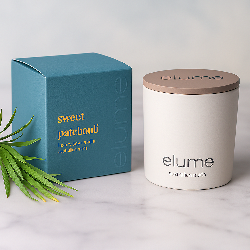 Elume candle and packaging on a light background