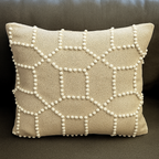 Schumacher Vento Embroidery Bespoke Cushion 50x50 cm featuring intricate white geometric embroidery on a neutral background, adding elegance to home decor.