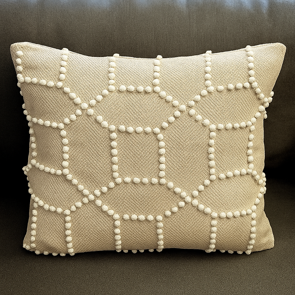 Schumacher Vento Embroidery Bespoke Cushion 50x50 cm featuring intricate white geometric embroidery on a neutral background, adding elegance to home decor.