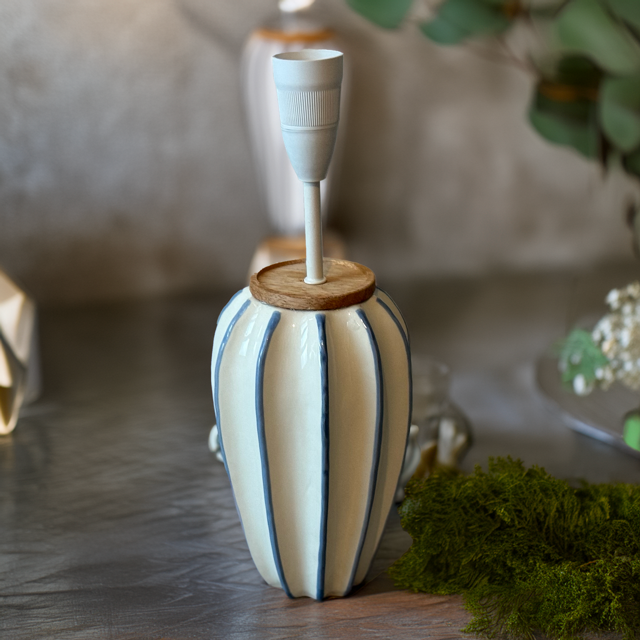 Azure Stripe Lamp Base by B.Bailey Design Co., exclusive to Luxe & Humble. White ceramic with hand-painted blue vertical stripes and wooden top. Coastal-inspired lighting.