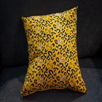 Golden leopard print pillow with Simba face accents – reversible cushion by Luxe & Humble
