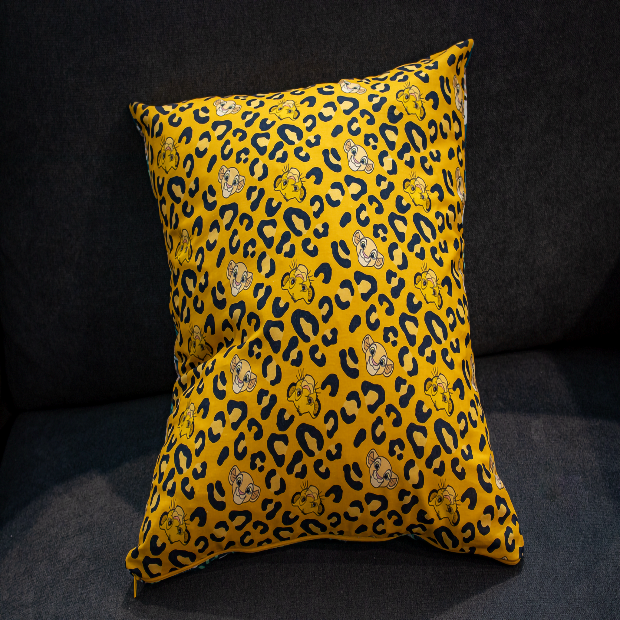 Golden leopard print pillow with Simba face accents – reversible cushion by Luxe & Humble
