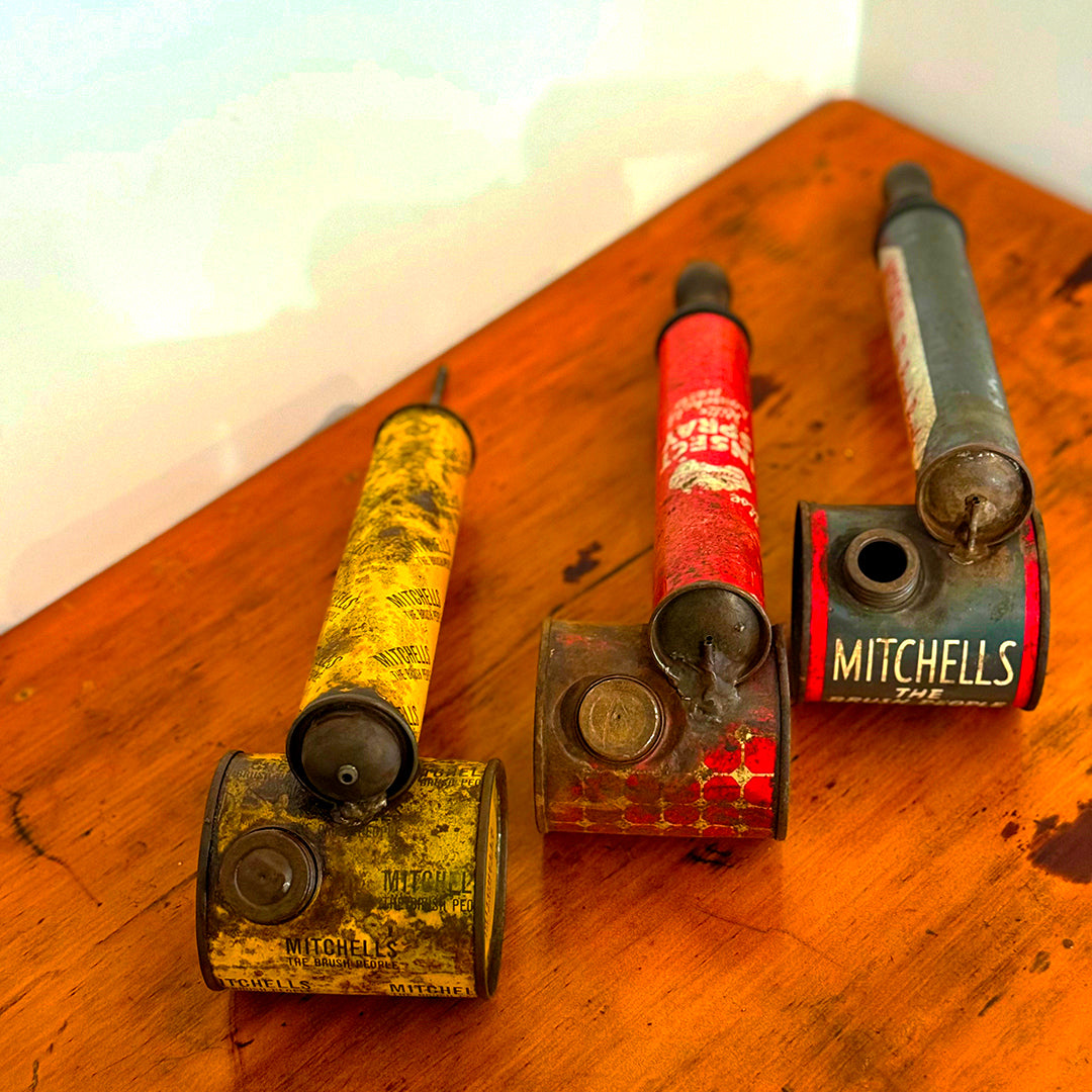 Collection of vintage bicycle handlebar grips on a wooden surface