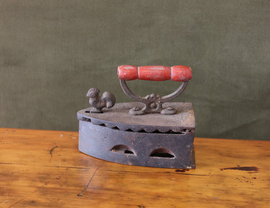 Antique Coal Fire Sad Iron with Rooster Finial.