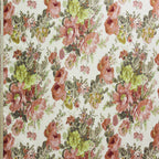 Floral patterned fabric with pink and green flowers on a white background