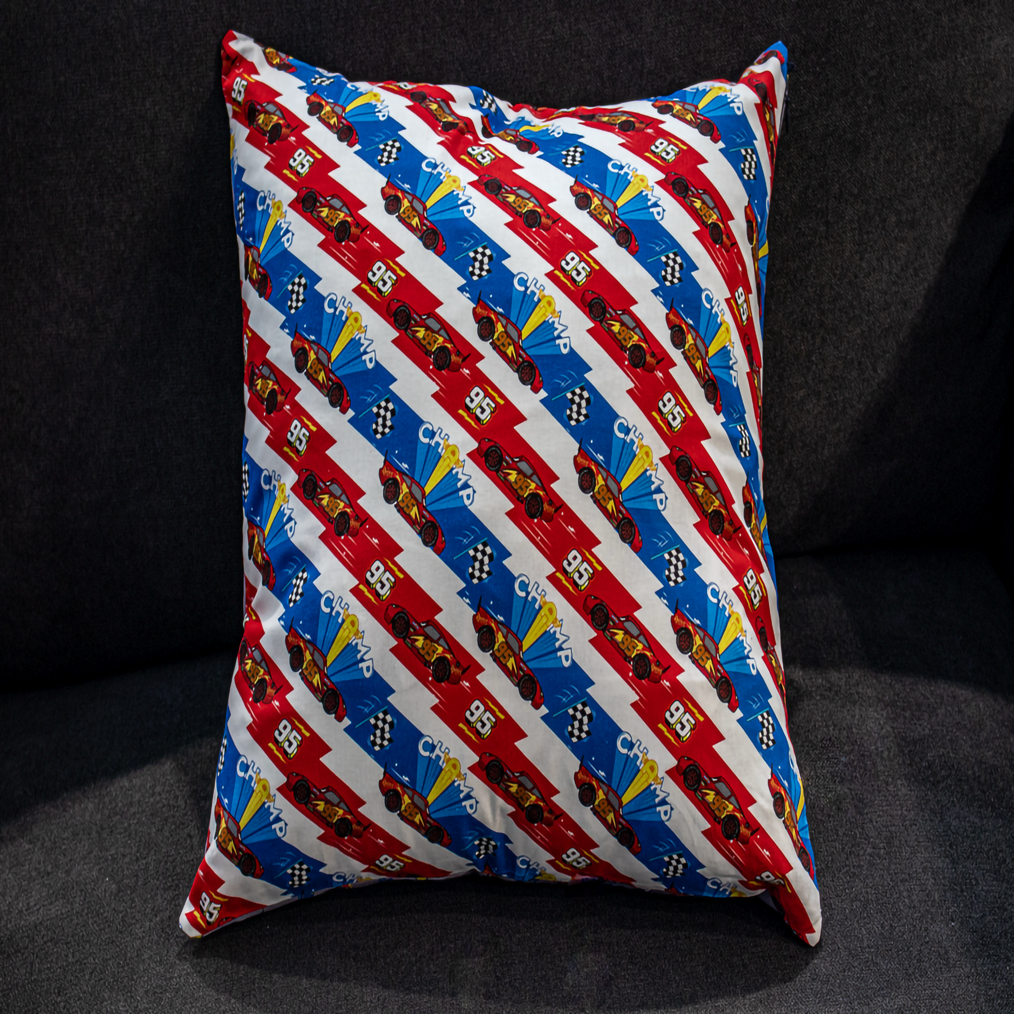 Lightning McQueen Cushion Blue and Red. Reversible. Perfect for a boys bedroom.