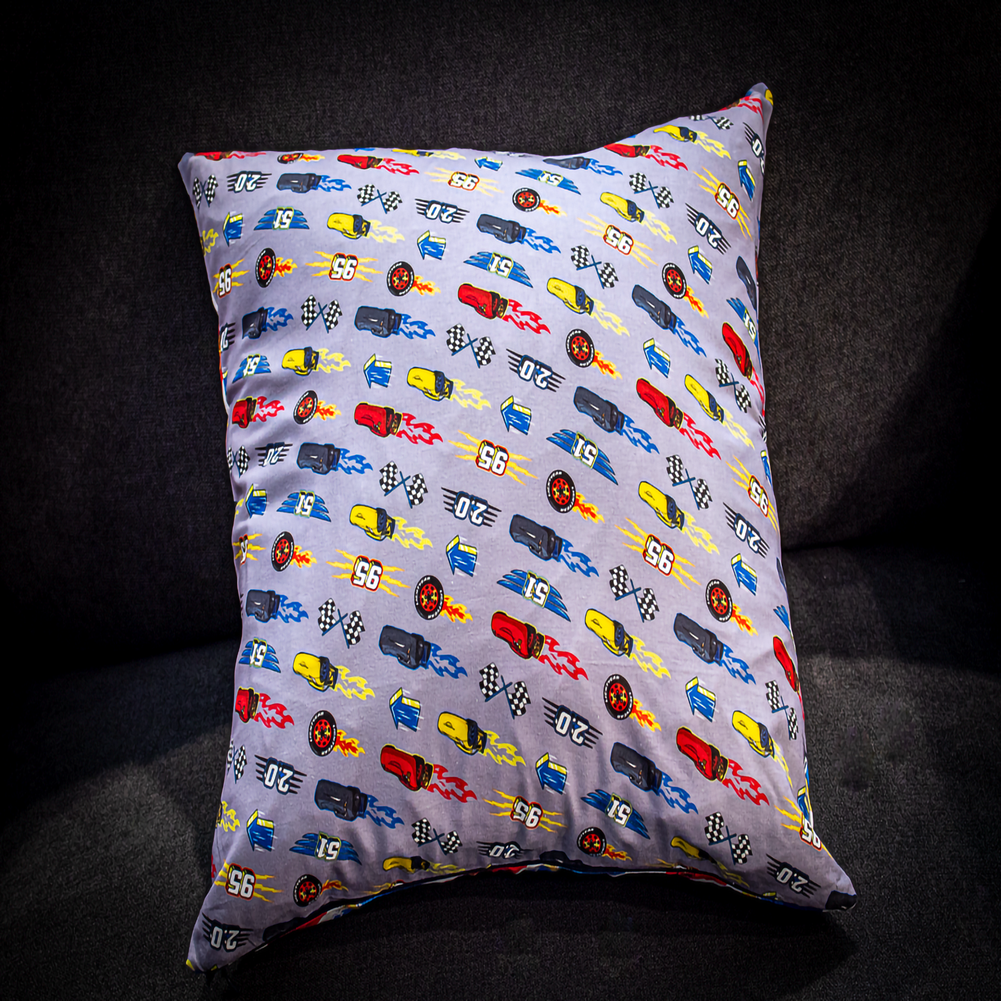 Lightning McQueen Cushion Blue and Red. Reversible. Perfect for a boys bedroom.