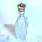 Cut glass and silver condiment bottle