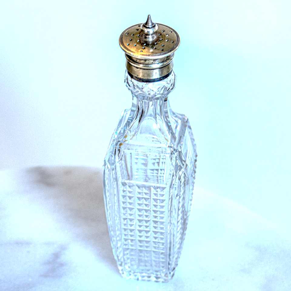 Cut glass and silver condiment bottle