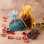 Petals & Peace Pouches by Luxe & Humble — handcrafted Australian aroma sachets filled with coloured Epsom salts, dried rose petals, and lavender buds. Displayed on marble with soft steam, scattered petals, and lavender sprigs for a natural spa-inspired look.