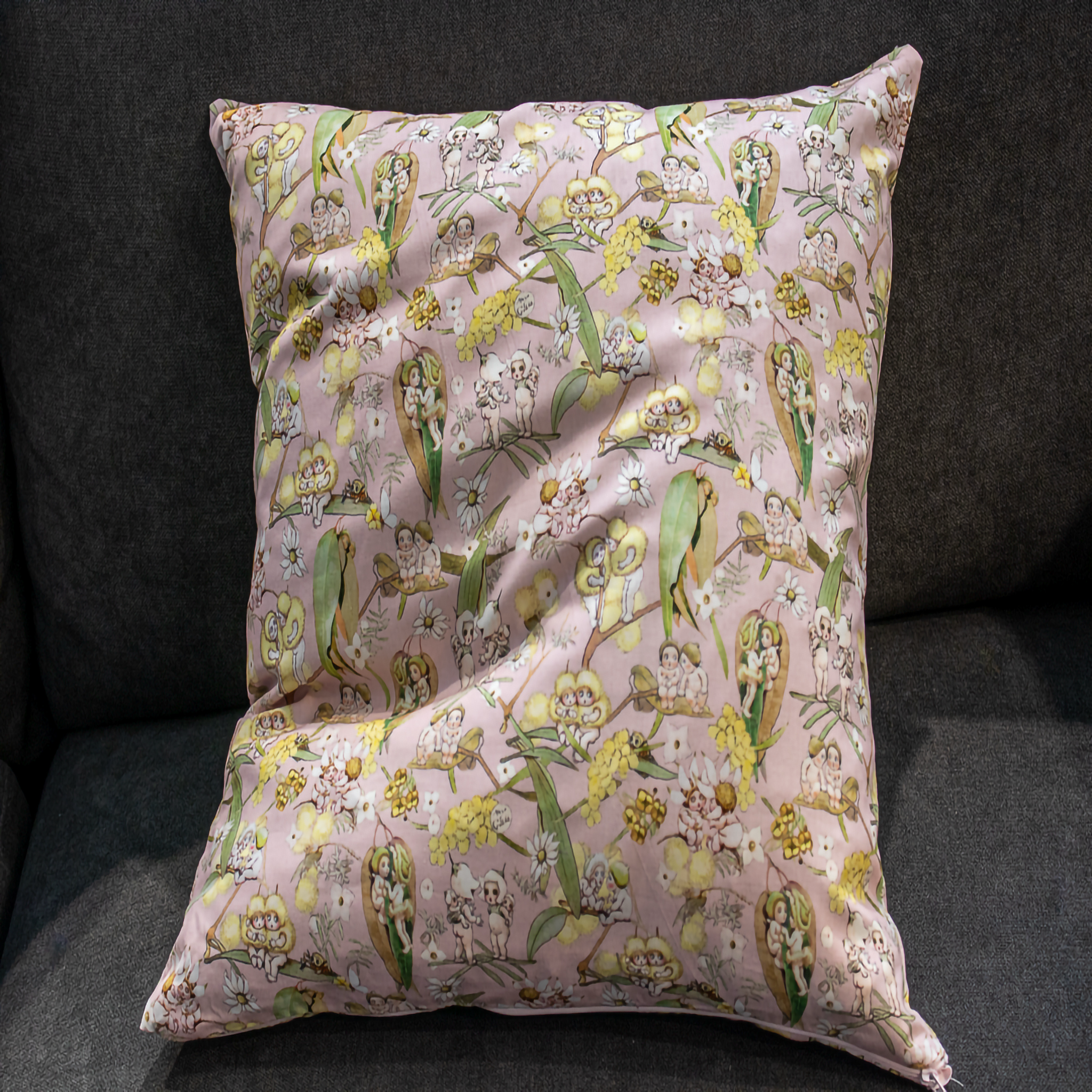 Pink May Gibbs gumnut baby cushion. 