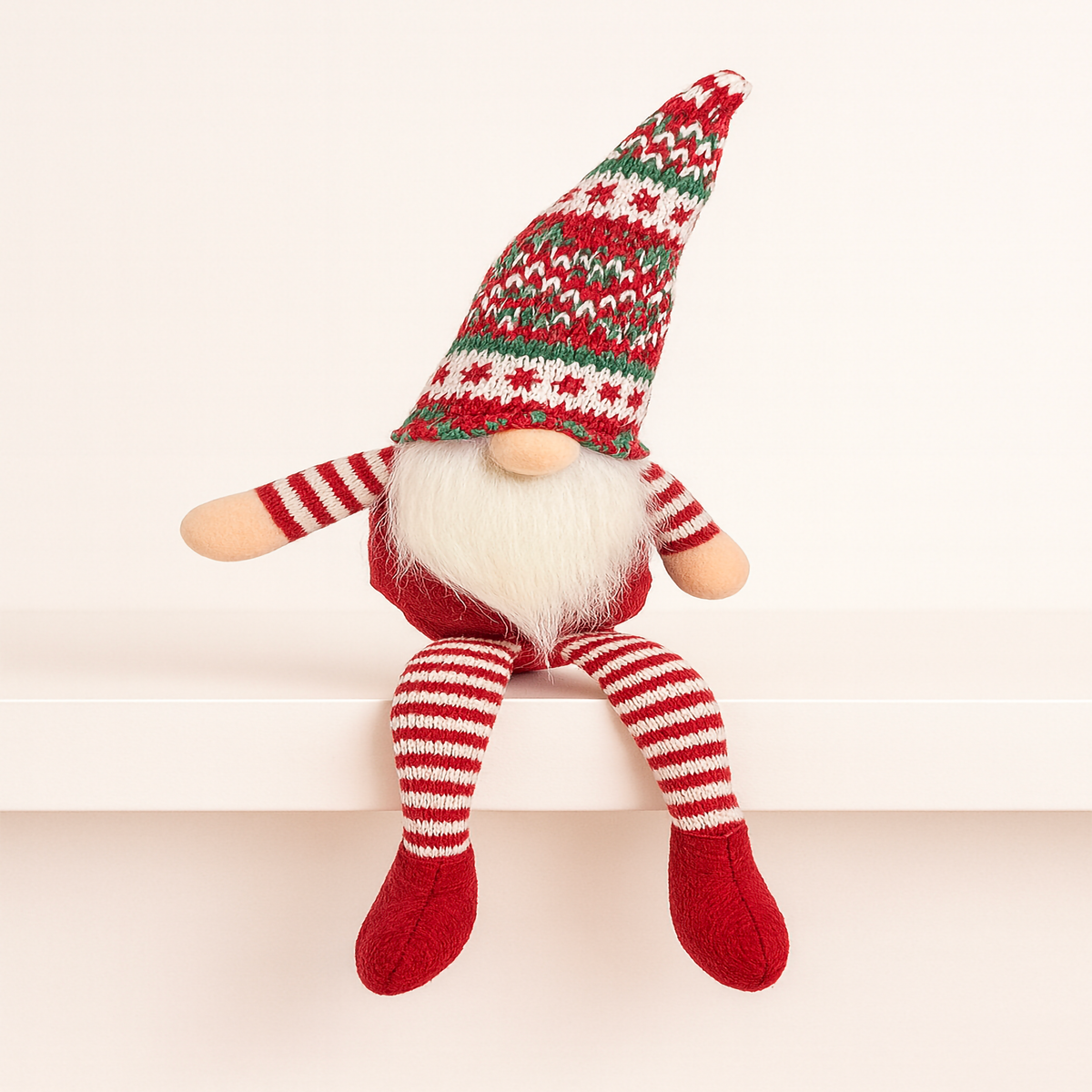 Red Nordic Christmas Gnome 39cm tall with long striped legs, white beard and traditional Scandinavian knitted hat – cute Christmas shelf sitter décor perfect for Australian styling by Luxe & Humble.