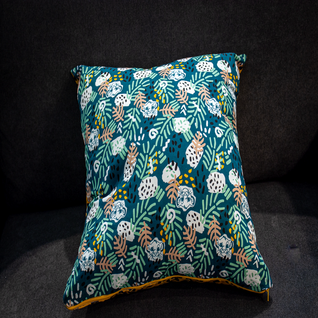 Reversible Lion King pillow with Simba, Timon, and Pumbaa print on turquoise background – Luxe & Humble