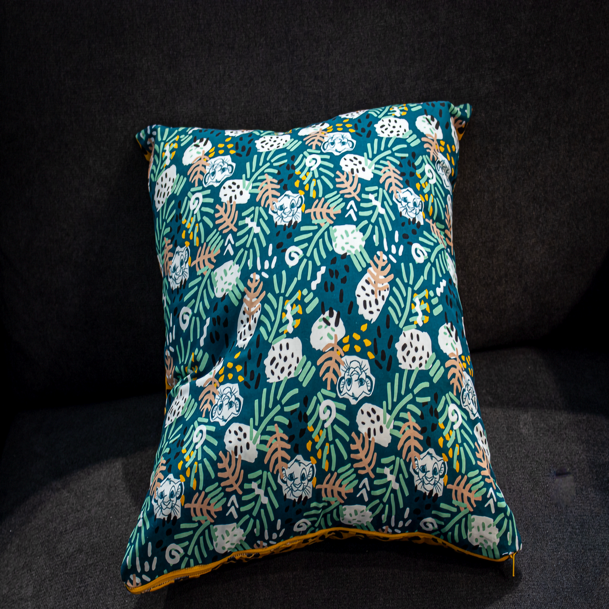 Reversible Lion King pillow with Simba, Timon, and Pumbaa print on turquoise background – Luxe & Humble