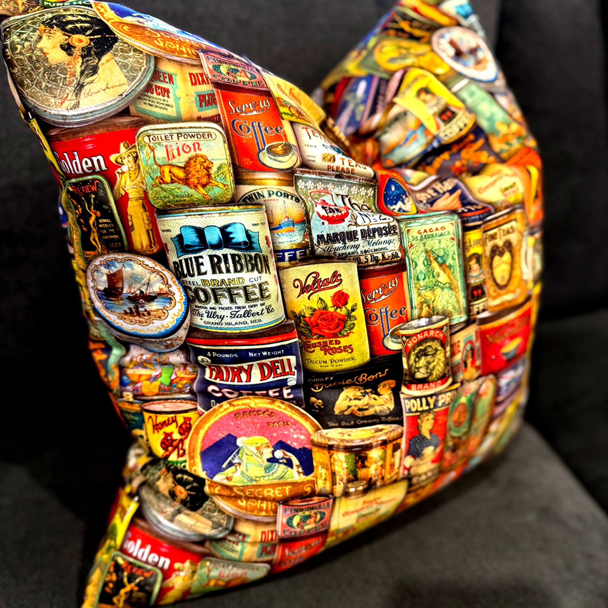 Decorative pillow with vintage-style tins of coffee and other products on a dark background by luxe and humble, Australia wide shipping. 