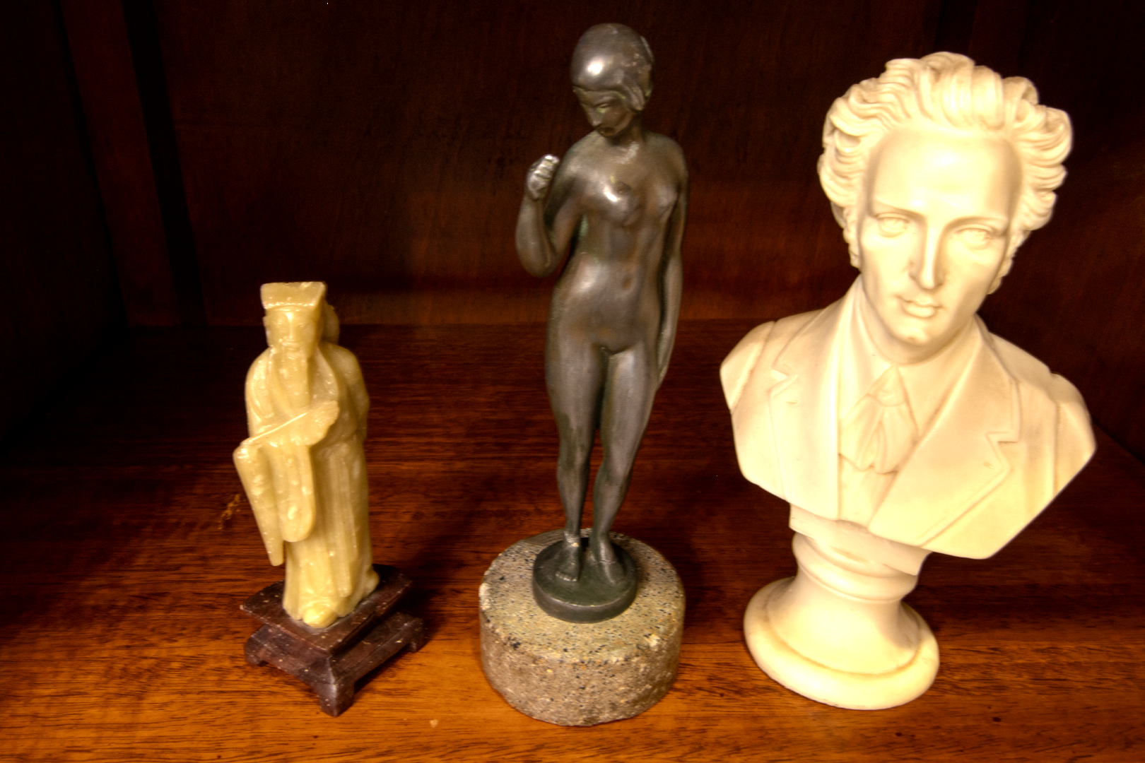 Three statues currently available to purchase, soapstone Chinese Man, Cast Iron Naked Lady and Marble Frederic Chopin bust. 