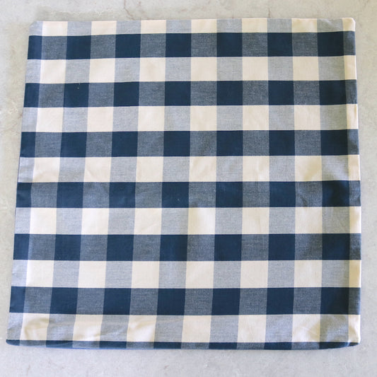 Navy gingham cushion with a solid navy back