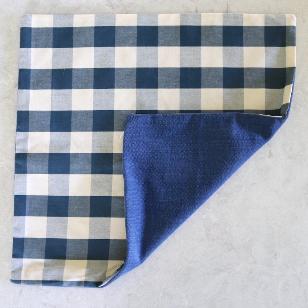 Navy gingham cushion with a solid navy back - front & back
