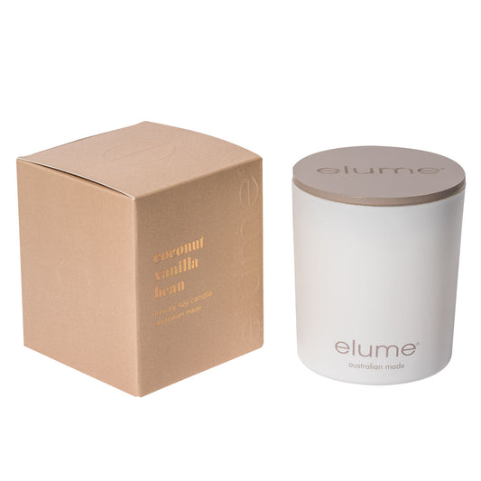 Elume Coconut Vanilla Bean Soy Candle Box, sitting beside the Candle with it's lid on.